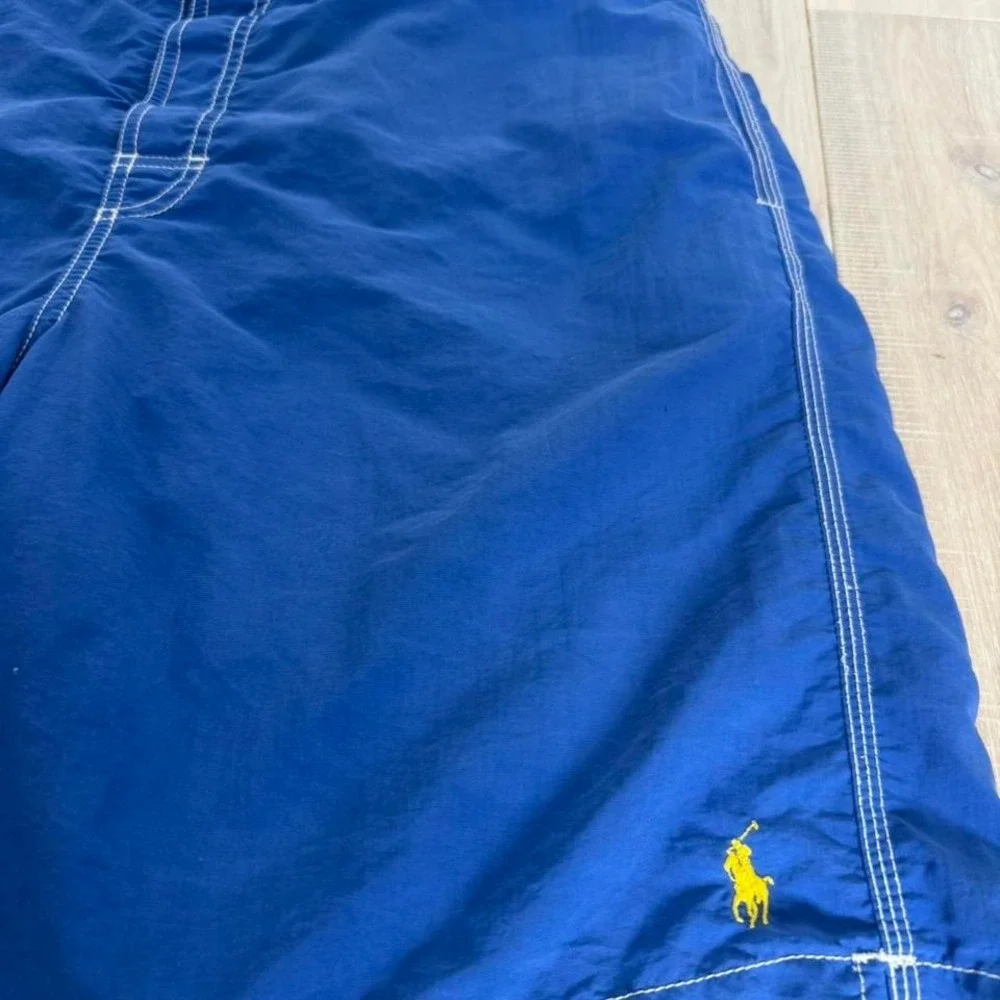 Y2K 2000s Ralph Lauren blue swim shorts with plaid lining. Size L